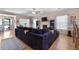 Open living room featuring hardwood floors, a cozy seating area and modern decor at 118 Netherfield Dr, Summerville, SC 29486