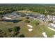 Community aerial view with golf course, tennis courts, pool, parking and residential housing at 1183 Farm Quarter Rd, Mount Pleasant, SC 29464