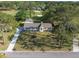 Aerial view of the home in a golf course community with mature trees and landscaping at 1183 Farm Quarter Rd, Mount Pleasant, SC 29464
