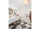 Stylish bathroom with a double vanity and black and white tile floor at 1183 Farm Quarter Rd, Mount Pleasant, SC 29464