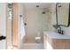 Bright bathroom featuring a glass-enclosed shower, modern fixtures, and stylish vanity with natural light at 1183 Farm Quarter Rd, Mount Pleasant, SC 29464
