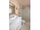 Bathroom features a modern vanity, brass fixtures, and a glass enclosed shower with white subway tile at 1183 Farm Quarter Rd, Mount Pleasant, SC 29464