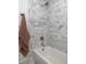 White bathtub with a marble tile surround at 1183 Farm Quarter Rd, Mount Pleasant, SC 29464