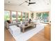Spacious living room with vaulted ceilings, lots of natural light, and backyard access at 1183 Farm Quarter Rd, Mount Pleasant, SC 29464
