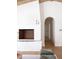 Bright living room features fireplace and arched doorway at 1183 Farm Quarter Rd, Mount Pleasant, SC 29464