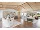 Open-concept living room featuring hardwood floors, wooden vaulted ceilings, and modern neutral-toned decor at 1183 Farm Quarter Rd, Mount Pleasant, SC 29464