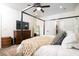 Comfortable main bedroom features a four-poster bed, dresser and walk-in closet at 1183 Guerins Bridge Rd, Awendaw, SC 29429