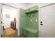Mudroom features a built-in bench and storage with convenient access to the laundry room at 1183 Guerins Bridge Rd, Awendaw, SC 29429