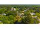 Aerial view of homes in wooded neighborhood near a pond at 119 Alwyn Blvd, Summerville, SC 29485
