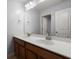 Bright bathroom with double sink vanity, large mirror, and a combination tub and shower at 121 Dream St, Summerville, SC 29483
