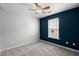 Neutrally decorated bedroom with a ceiling fan and one window at 121 Dream St, Summerville, SC 29483