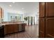 Open-concept kitchen with stainless steel appliances and an island sink at 121 Dream St, Summerville, SC 29483