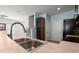 Bright kitchen with stainless steel sink and view to the staircase at 121 Dream St, Summerville, SC 29483
