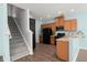 Spacious kitchen with plenty of counter space and connection to the staircase at 121 Dream St, Summerville, SC 29483