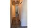 Inviting hallway featuring neutral paint, decorative lighting, and tile floors at 124 Droos Way, Charleston, SC 29414