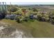 A scenic aerial view of townhomes with marsh-front access and mature trees at 1242 Creek Watch, Seabrook Island, SC 29455