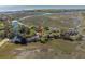 An aerial view of marsh-front townhomes with beautiful views and coastal foliage at 1242 Creek Watch, Seabrook Island, SC 29455