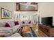 Open-concept living room with vaulted ceiling and a view to the loft at 1242 Creek Watch, Seabrook Island, SC 29455