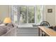Living room window seat with plantation shutters, offering a cozy spot to relax and enjoy the natural light at 1242 Creek Watch, Seabrook Island, SC 29455