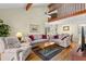 Spacious living room featuring high ceilings, comfortable seating, and an open floor plan at 1242 Creek Watch, Seabrook Island, SC 29455