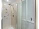 Walk-in shower featuring custom tile and updated shower head and fixtures at 1242 Creek Watch, Seabrook Island, SC 29455
