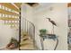 Unique carpeted spiral staircase accented by modern decor at 1242 Creek Watch, Seabrook Island, SC 29455