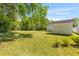 Expansive backyard with a storage shed, offering plenty of room for outdoor activities and storage at 1324 Maxwell St, North Charleston, SC 29405