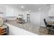 Modern kitchen featuring granite countertops, stainless steel appliances, and ample cabinet space at 1324 Maxwell St, North Charleston, SC 29405