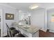 Eat-in kitchen bar features granite countertops and stainless steel appliances at 1324 Maxwell St, North Charleston, SC 29405