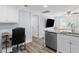 Well-designed living space with a kitchen, office, and seating area, great for relaxing and entertaining at 1324 Maxwell St, North Charleston, SC 29405