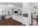 Open-concept living space featuring granite countertops and stainless appliances at 1324 Maxwell St, North Charleston, SC 29405