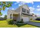 Side view of a two-story home with a covered porch and well-maintained lawn at 136 Pontoria Dr, Summerville, SC 29483
