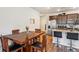 Well-equipped kitchen and adjacent dining area with seating for four at 136 Pontoria Dr, Summerville, SC 29483