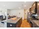 Spacious kitchen island features granite countertops, stainless steel appliances, and modern finishes at 136 Pontoria Dr, Summerville, SC 29483