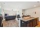 Open floor plan features a kitchen with granite countertops and stainless steel appliances at 136 Pontoria Dr, Summerville, SC 29483