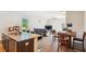 Open-concept living area with wood-look floors and ample natural light at 136 Pontoria Dr, Summerville, SC 29483