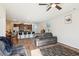 Bright living room featuring an open layout, ceiling fan, and natural light at 136 Pontoria Dr, Summerville, SC 29483