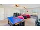Multi-use room provides ping pong and foosball tables, gaming consoles, and comfortable beanbag seating at 136 Pontoria Dr, Summerville, SC 29483