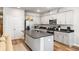 Well-equipped kitchen featuring granite countertops, stainless steel appliances, and ample storage at 1411 Thin Pine Dr, Johns Island, SC 29455
