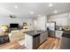 Modern kitchen with stainless steel appliances, a central island, and stylish countertops at 1411 Thin Pine Dr, Johns Island, SC 29455