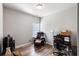 Office with a leather chair, wood look floors, and a window at 1411 Thin Pine Dr, Johns Island, SC 29455