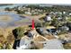 Aerial view of a waterfront home and neighborhood with beautiful water views at 1481 Battery Reynolds Ct, Charleston, SC 29412
