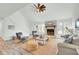 Inviting living room with vaulted ceiling, stone fireplace, and a cozy seating area at 1481 Battery Reynolds Ct, Charleston, SC 29412