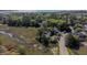 Aerial view of home nestled in a lush, wooded area with marsh views at 1502 Marsh Haven, Seabrook Island, SC 29455