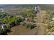 Scenic aerial view of the property near marsh and woods with waterfront in the distance at 1502 Marsh Haven, Seabrook Island, SC 29455