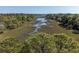 Stunning aerial view of a marsh landscape with winding waterways and lush greenery at 1502 Marsh Haven, Seabrook Island, SC 29455