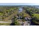 Scenic aerial view of marshfront homes bordered by winding streams and lush forest at 1502 Marsh Haven, Seabrook Island, SC 29455