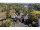 Overhead view showcasing marshfront home with private decks and mature trees at 1502 Marsh Haven, Seabrook Island, SC 29455