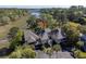 Stunning aerial view of the property surrounded by lush trees and serene marshland, showcasing its prime location at 1502 Marsh Haven, Seabrook Island, SC 29455