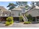 Charming coastal home with elevated design, lush landscaping, and convenient parking, located in a serene community at 1502 Marsh Haven, Seabrook Island, SC 29455